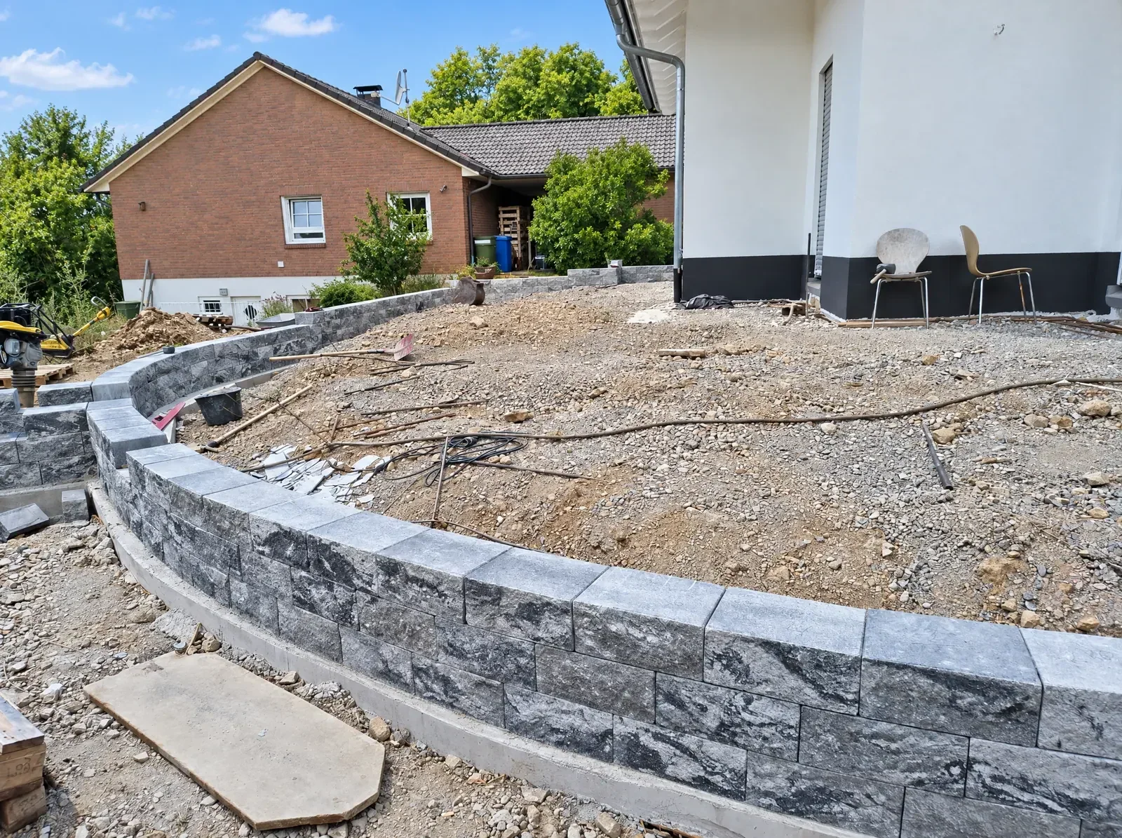 Natursteinmauer und Terrasse — Projekt von Außenanlagenbau Melcher